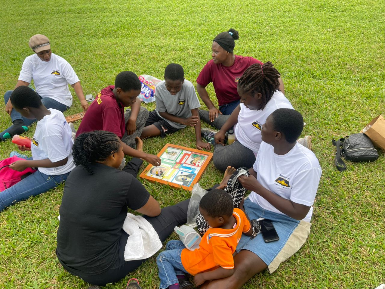 Youth playing games at a picnic